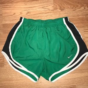 Woman’s Green Nike Running Shorts